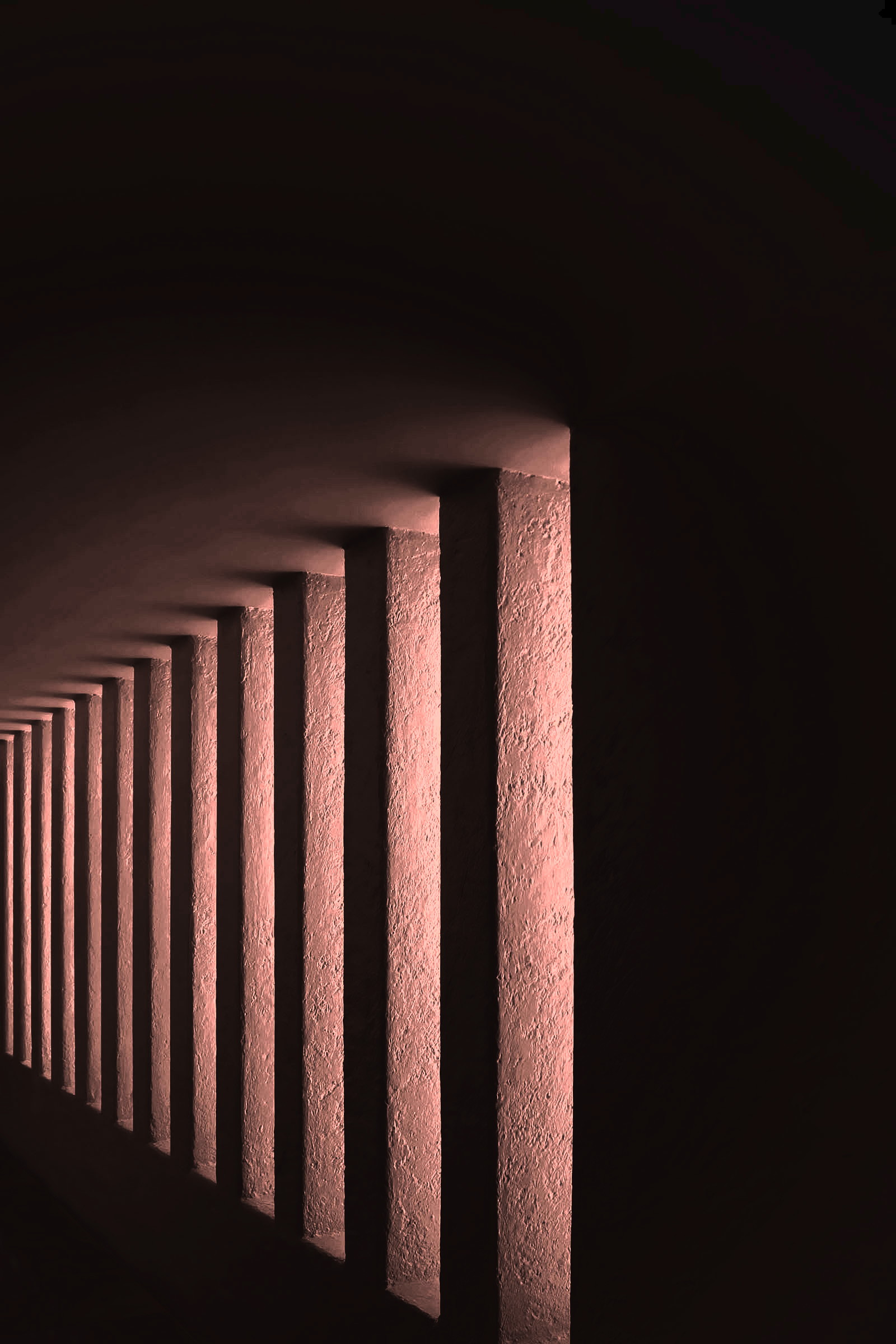 A colonnade in warm, raking light