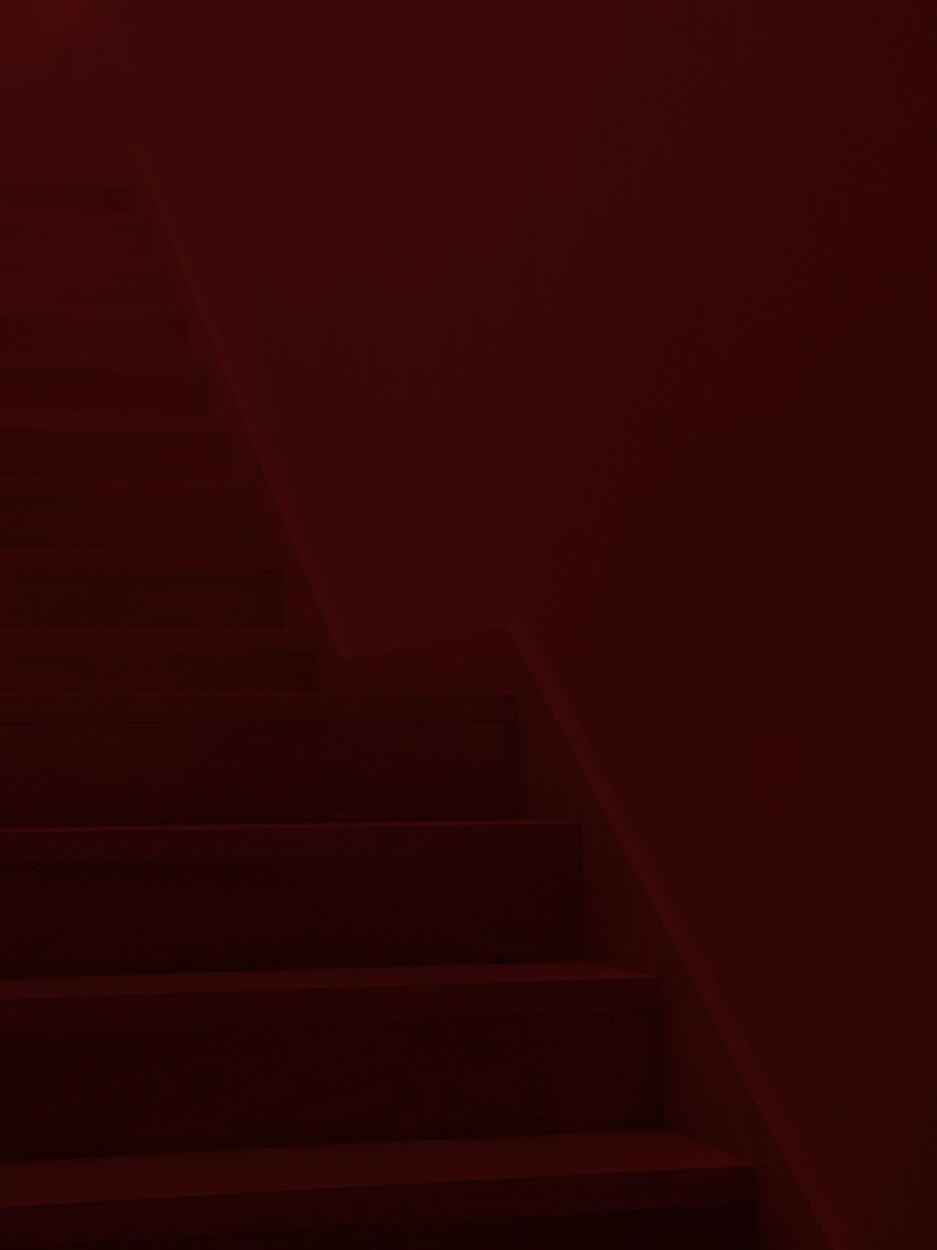 A stairwell in shadow